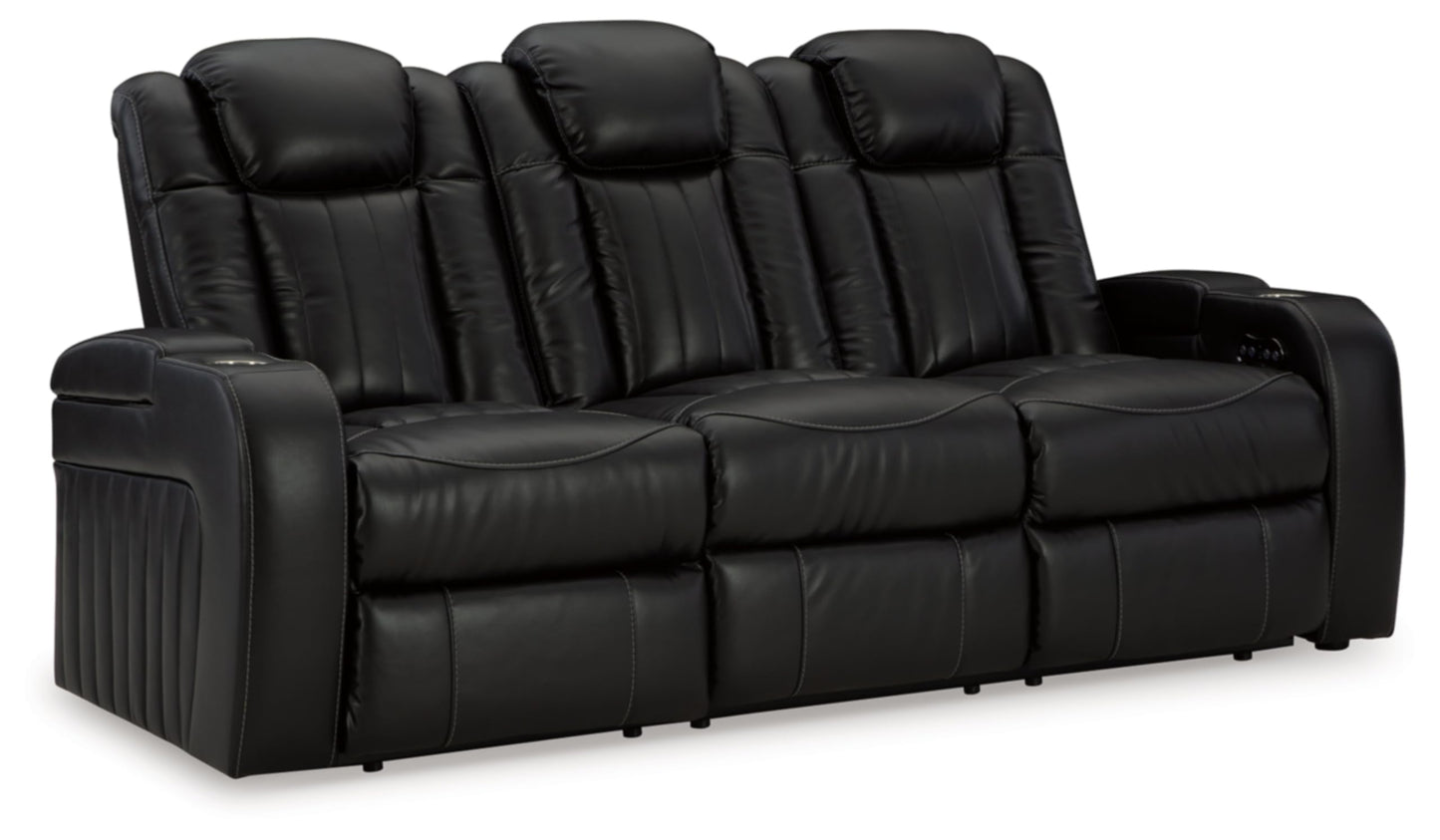 Signature Design by Ashley Caveman Den Modern Faux Leather Power Reclining Sofa with Adjustable Headrest, Drop Down Table, Electrical Outlets and LED Reading Lights, Black